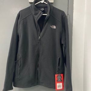 North face mens large zip front black fleece jacket.